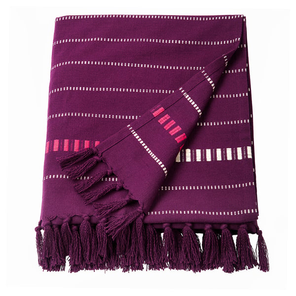 Purple woven cotton blanket with fringe and white accent lines.