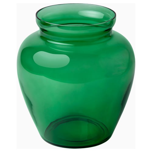 A green glass vase named AROMATISK with a soft, organic shape, featuring a wide opening and a handcrafted look.