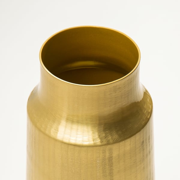 Golden metallic vase with smooth, shiny texture and slight vertical grooves.