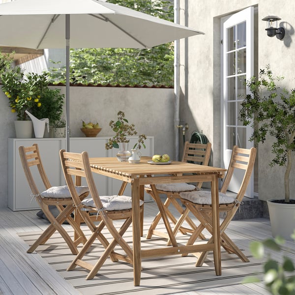 ASKHOLMEN Table+4 folding chairs, outdoor, acacia/Kuddarna light grey-beige, 143x75 cm