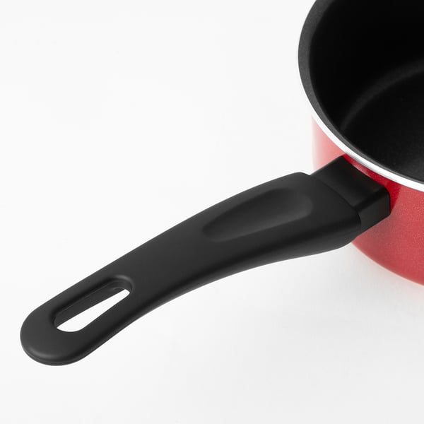 Red saucepan with black handle, sol-gel ceramic non-stick coating, well-built for easy handling and cleaning.