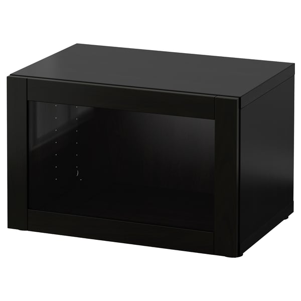 Black BESTÅ storage unit. Sleek, rectangular design with glass door. Modern, minimalist style.