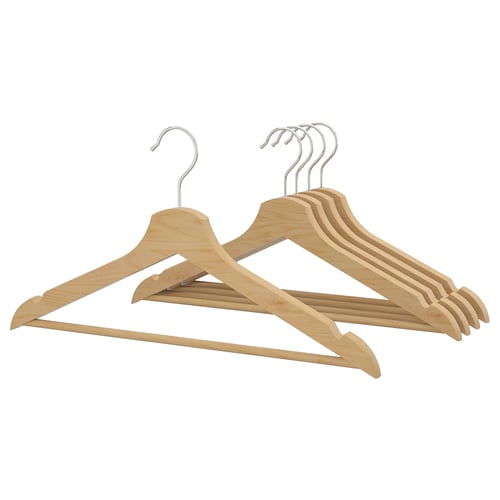 Five light brown wooden hangers with metal hooks, neatly stacked.