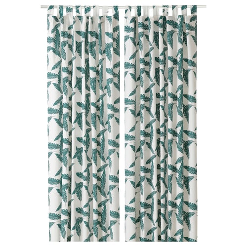 BUSKMÄTARE: green leaf-print curtains with eyelet heading, made of cotton.