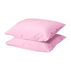 Two soft, light pink DVALA pillows with a smooth, square shape and simple, clean design, made from 100% cotton.