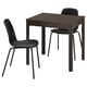 An EKEDALEN dining set with a dark brown table and black chairs.