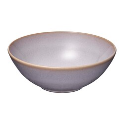 A lone lavender-hued stoneware bowl with a smooth, matt glazed finish and a rustic, handcrafted appearance.