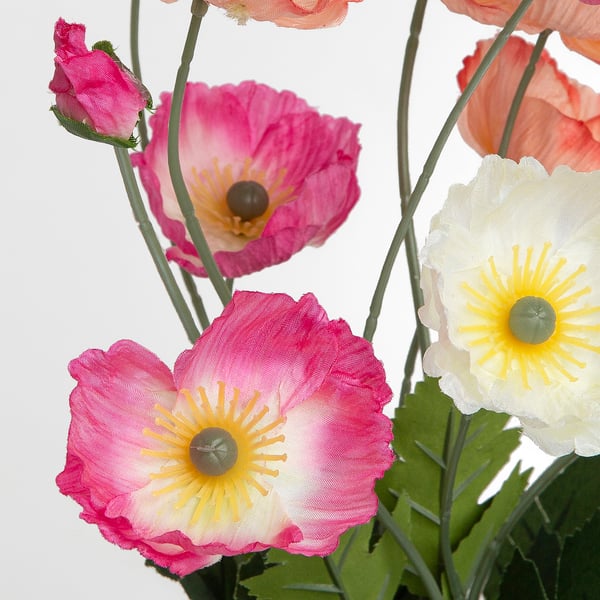 Bright pink and white artificial poppies, detailed and lifelike, arranged closely together on green stems.