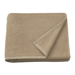 Folded beige GULVIAL cotton towel, textured, soft, 150gsm.