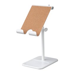 A white HAVREHOJ tablet stand with adjustable angles and height, featuring a cork surface for protection and a tray at the bottom.