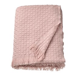Light pink HORNMAL throw, soft & fluffy, woven texture, fringe edges.