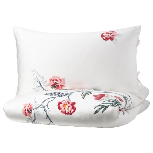 White floral bedding set with pink flowers on green leaves, sateen lyocell fabric, rectangle pillows.