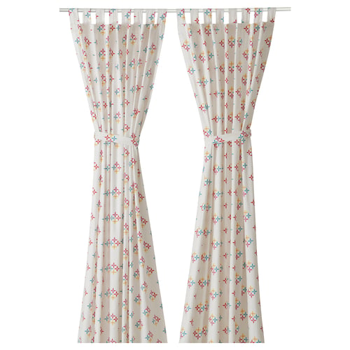 KLIBBARV curtains: white with multicolor star patterns, cotton, rectangular, tied back.