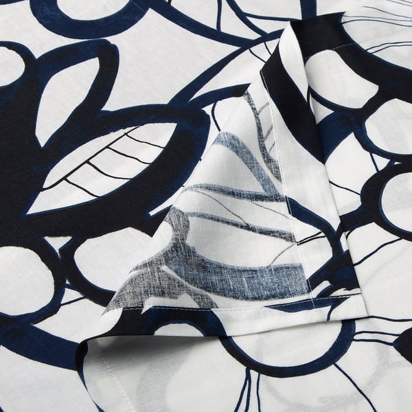 Fabric with blue abstract leaf prints, high quality cotton, recycled polyester thread, artful design.