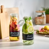 KORKEN Bottle shaped jar with lid, clear glass/black, 1 l