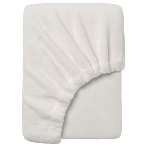 White recycled polyester blanket, neatly folded, soft and fluffy fleece.