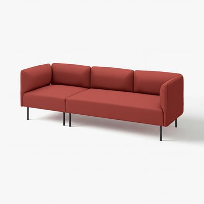 Bright red modern couch; sleek, straight lines, metal legs.