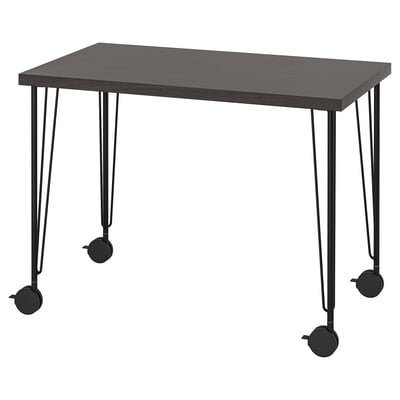 Modern black desk with metal legs and wheels. Rectangular shape, sleek design for easy movement.