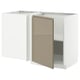White l-shaped kitchen cabinet, one door open, light brown inside, modern design.