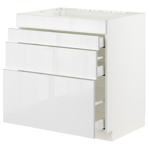 Modern white gloss METOD kitchen cabinet with three drawers.