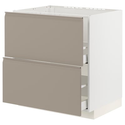 METOD kitchen cabinet in beige with smooth grey handles and modern design.