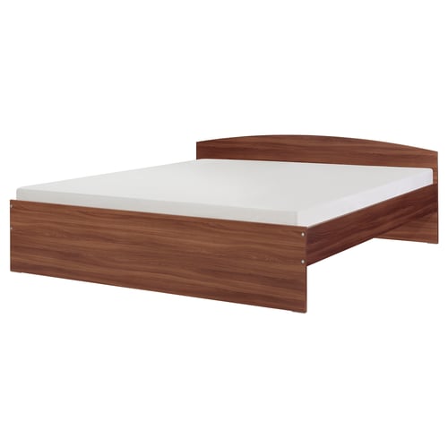 Depicts a modern wooden bed named NODELAND with rounded edges and storage space. It a sturdy frame suitable for varied mattress thicknesses.