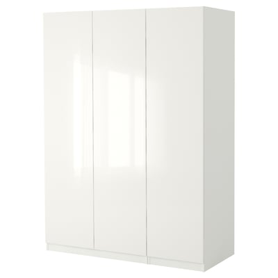 White PAX wardrobe, tall and slim, open doors reveal shelves and drawers.