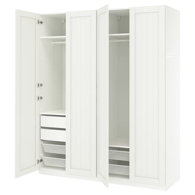 This image shows a white PAX wardrobe with open doors revealing drawers and shelves.