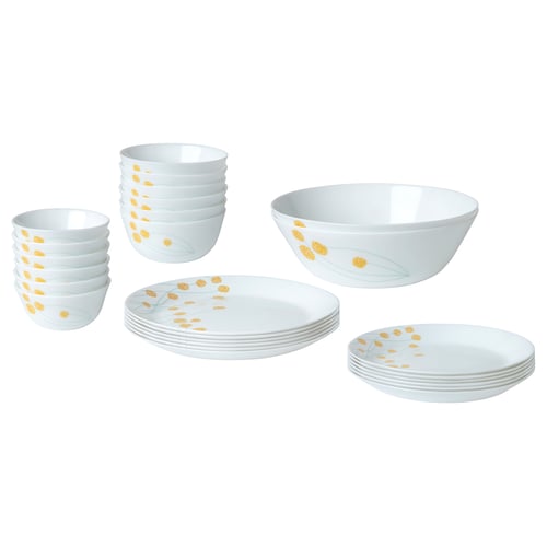 SKRÄNTÄRNA set: white dishes with yellow florals. Includes plates, bowls, and cups. Elegant, stackable, durable. Perfect for everyday and parties.