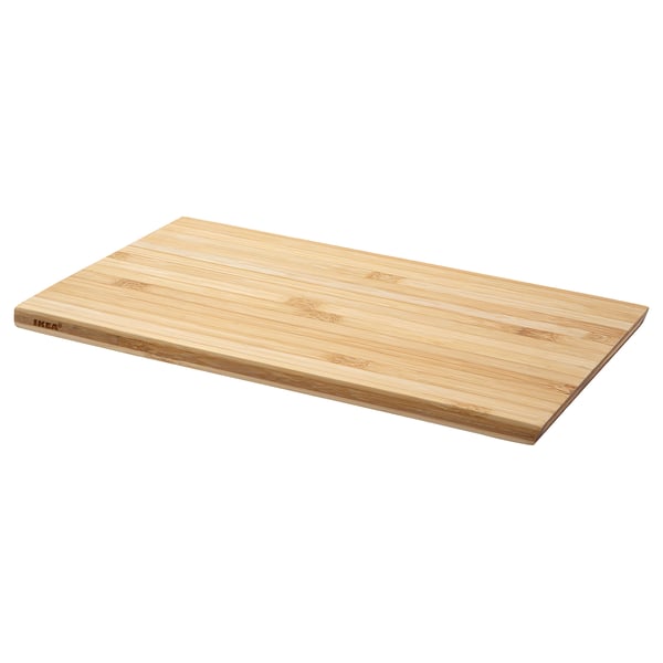 IKEA SNEDNÄBB bamboo cutting board, light brown, rectangular, simple design.