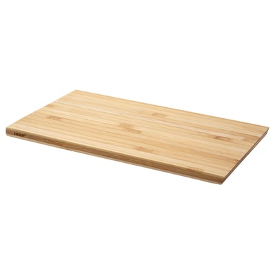 IKEA SNEDNÄBB bamboo cutting board, light brown, rectangular, simple design.