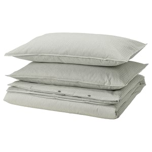 Three stacked SOLFIBBLA pillows, green-gray striped, rectangular with zip, 100% cotton.