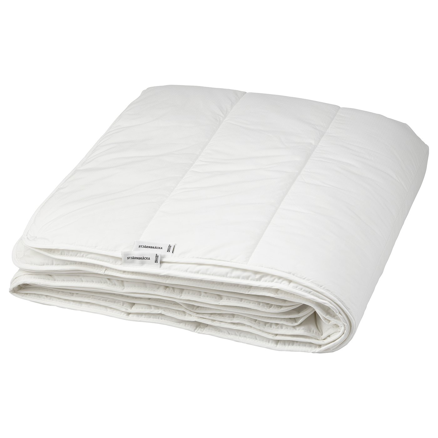 Rectangular STJÄRNBRÄCKA duvet, folded, soft and breathable for year-round use.