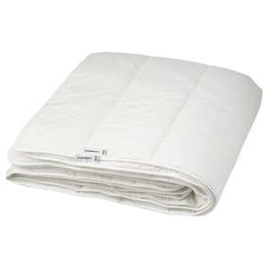 Rectangular STJÄRNBRÄCKA duvet, folded, soft and breathable for year-round use.