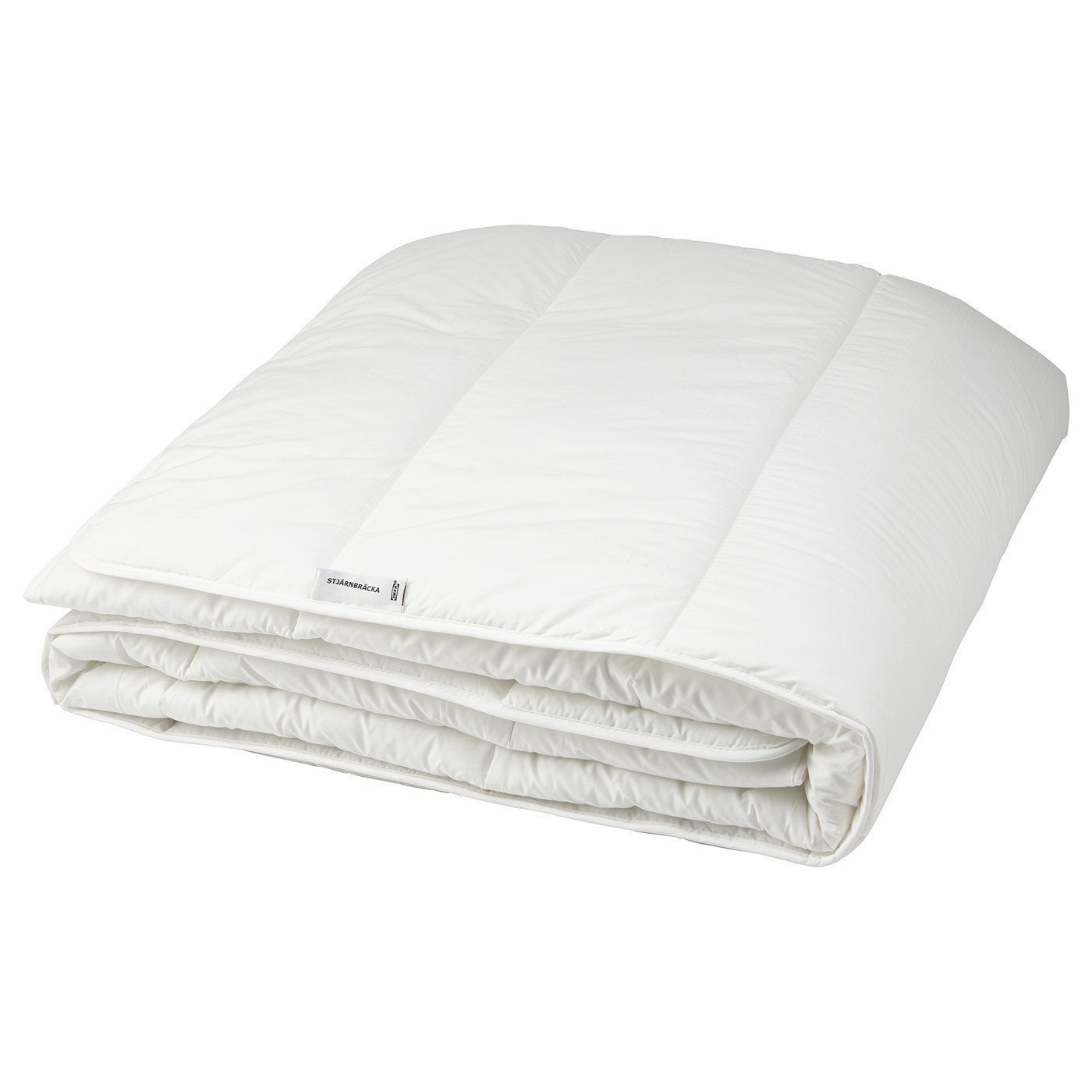 A white STJÄRNBRÄCKA duvet, folded, with soft and breathable lyocell and cotton fabric, and a fluffy recycled polyester and lyocell filling.