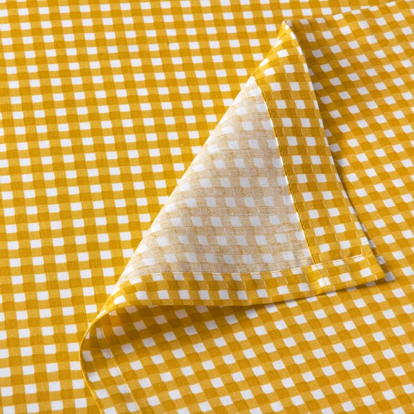 Yellow chequered bedsheet, soft cotton-viscose blend, neatly folded.
