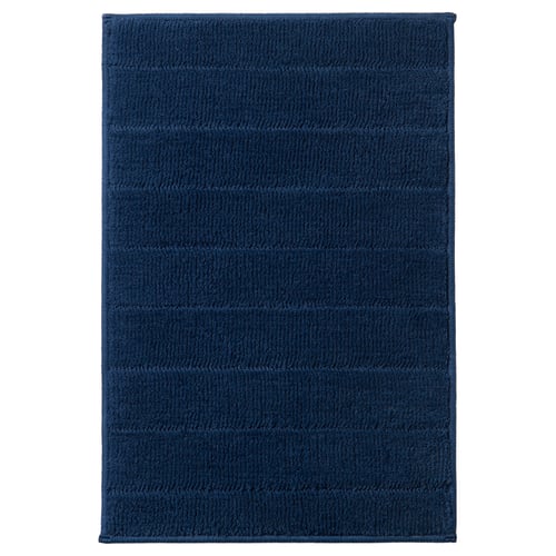 TIDNINGSBUD blue rectangular bath mat, textured surface, polyester, quick drying, latex backing.