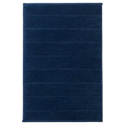TIDNINGSBUD blue rectangular bath mat, textured surface, polyester, quick drying, latex backing.
