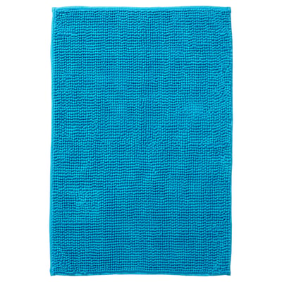 Bright blue TOFTBO bath mat, rectangular, textured, made from recycled polyester.