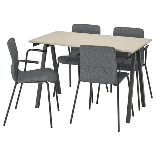 Modern dining set with beige table and four grey fabric chairs. Black metal frames. Minimalist design.