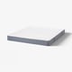 White VESTMARKA mattress, rectangular, firm, with grey sides and foam top layer.