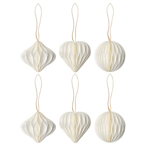 Six white paper ornaments hang in two rows, each uniquely shaped, with jute strings for hanging.