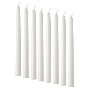 Eight white candles of uniform shape and size neatly arranged. Simple and elegant, suitable for decor.
