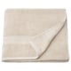Folded light tan VITBACKEN bath towel, soft cotton terry, classic rectangular design.