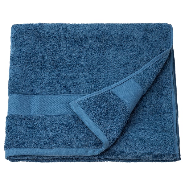 Blue VITBACKEN bath towel, folded, 100% cotton.