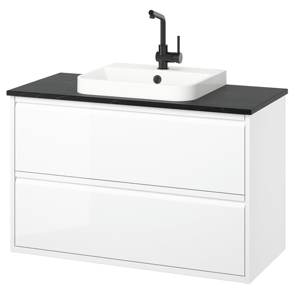 Mobile bagno bianco moderno con elegante piano di lavoro nero e lavabo quadrato, montato a parete con un design minimalista.