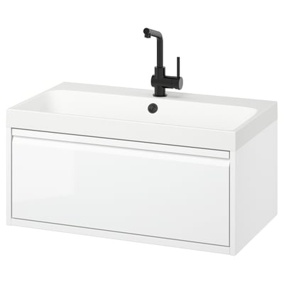 Mobile bagno bianco moderno, cassetto singolo, bordi eleganti, a parete con rubinetto nero.