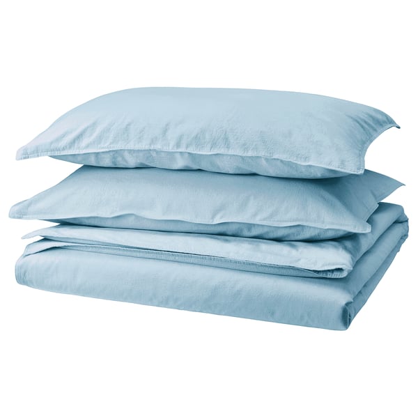 Set di biancheria da letto azzurro. Include piatto e federe. Morbido cotone prelavato. Design semplice e rettangolare. Perfetto per camere da letto accoglienti e tranquille.