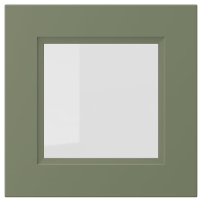 Porta in vetro verde AXSTAD con superficie grigio-verde opaca, caratterizzata da un pannello in vetro quadrato incassato.