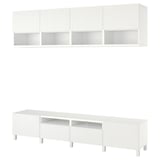 Un mobile porta tv BESTÅ bianco con ampio mobile tv e pensili. Design moderno con linee pulite, che offre ampio spazio di archiviazione.